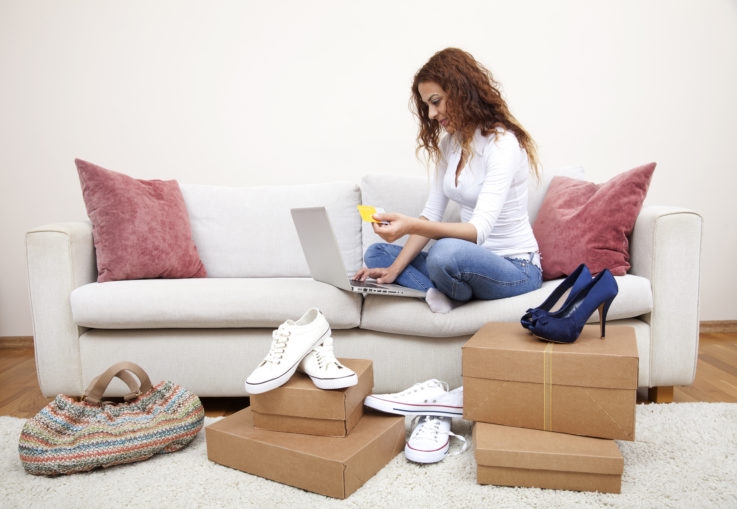 Woman online shopping for shoes